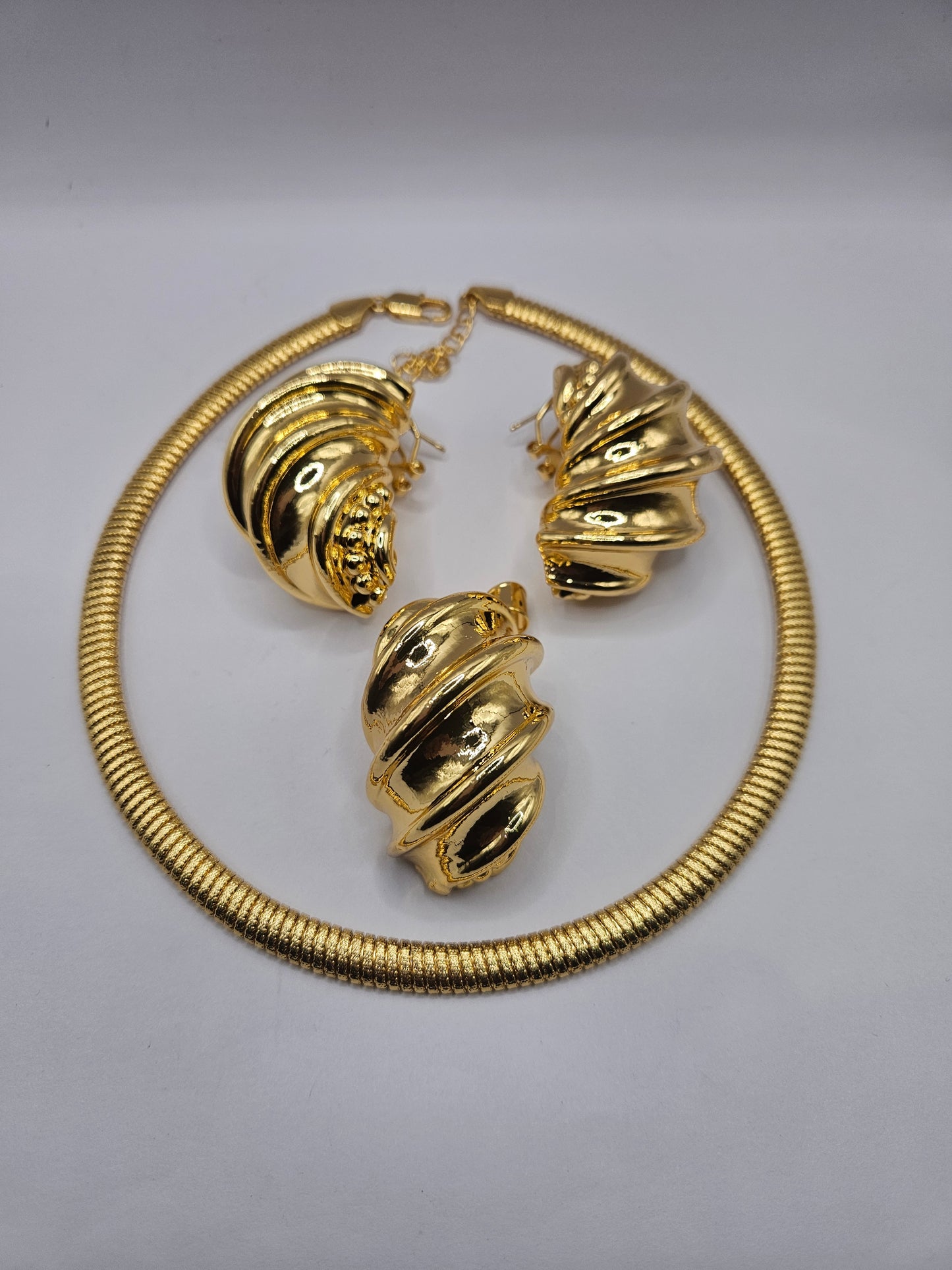 Gold-Plated Swirl Statement Necklace & Earrings Set – Modern Sculptural Design