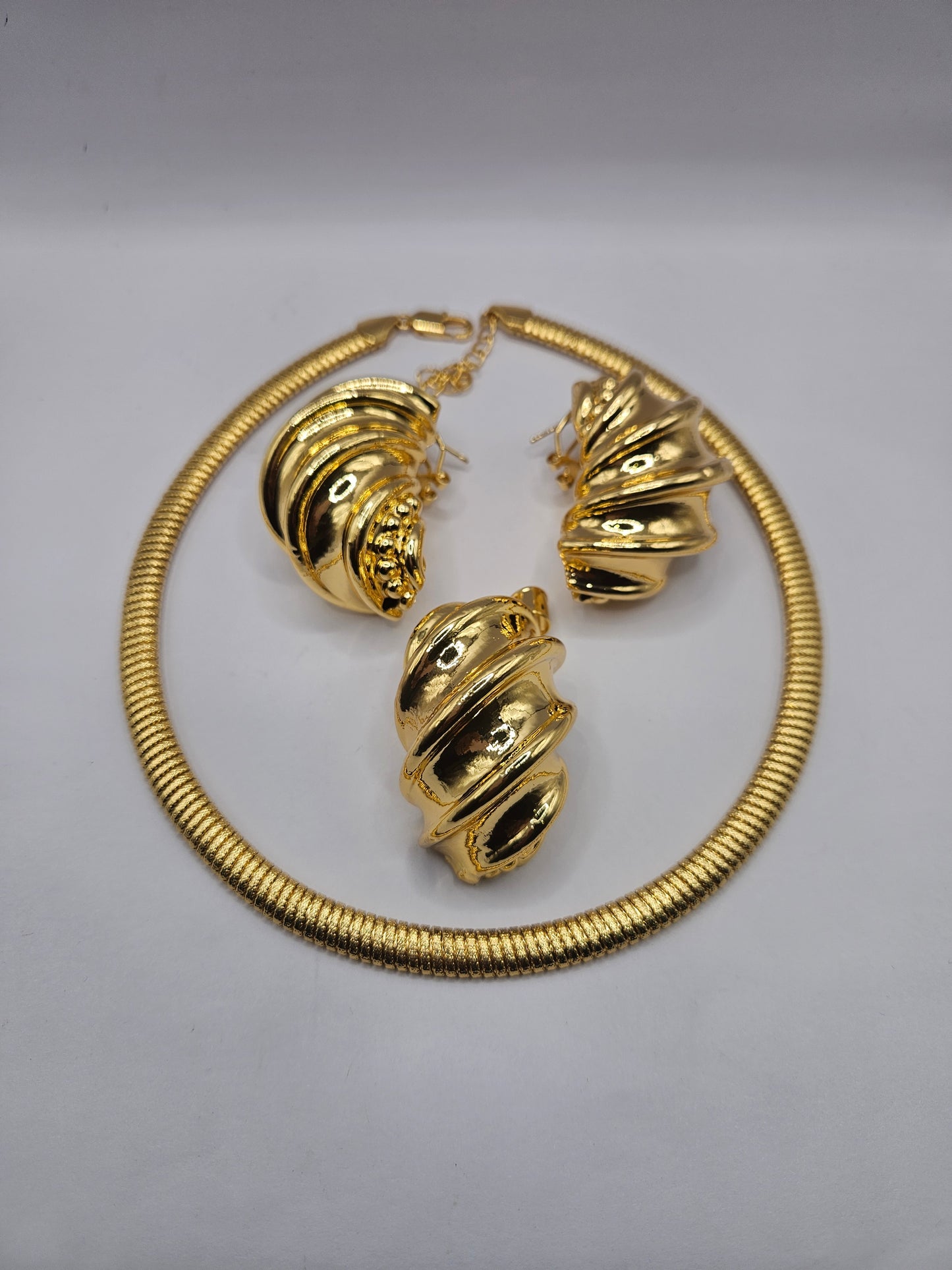 Gold-Plated Swirl Statement Necklace & Earrings Set – Modern Sculptural Design