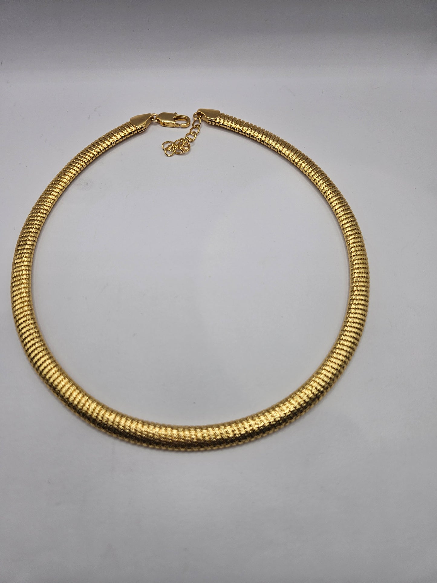 Gold-Plated Swirl Statement Necklace & Earrings Set – Modern Sculptural Design