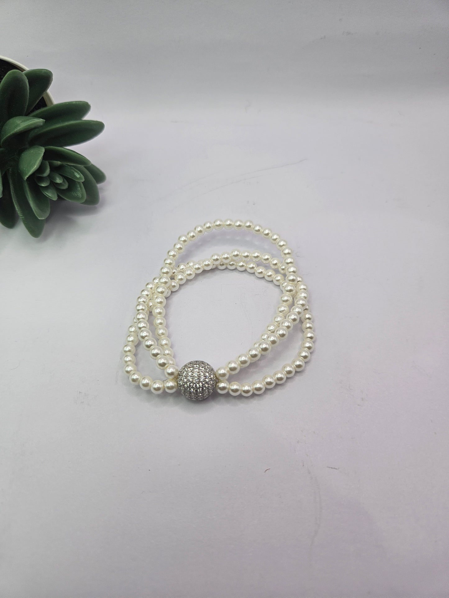 Classic Pearl Beaded Stretch Bracelet with Crystal Accent.